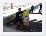 masanoriinoueminimini * Masanori Inoue (JPN) at the finish dock with his charming Mini Mini Sled. The former Olympic bobsledder wowed spectators with a race-best 4.68 push time in both heats. * 640 x 480 * (138KB)
